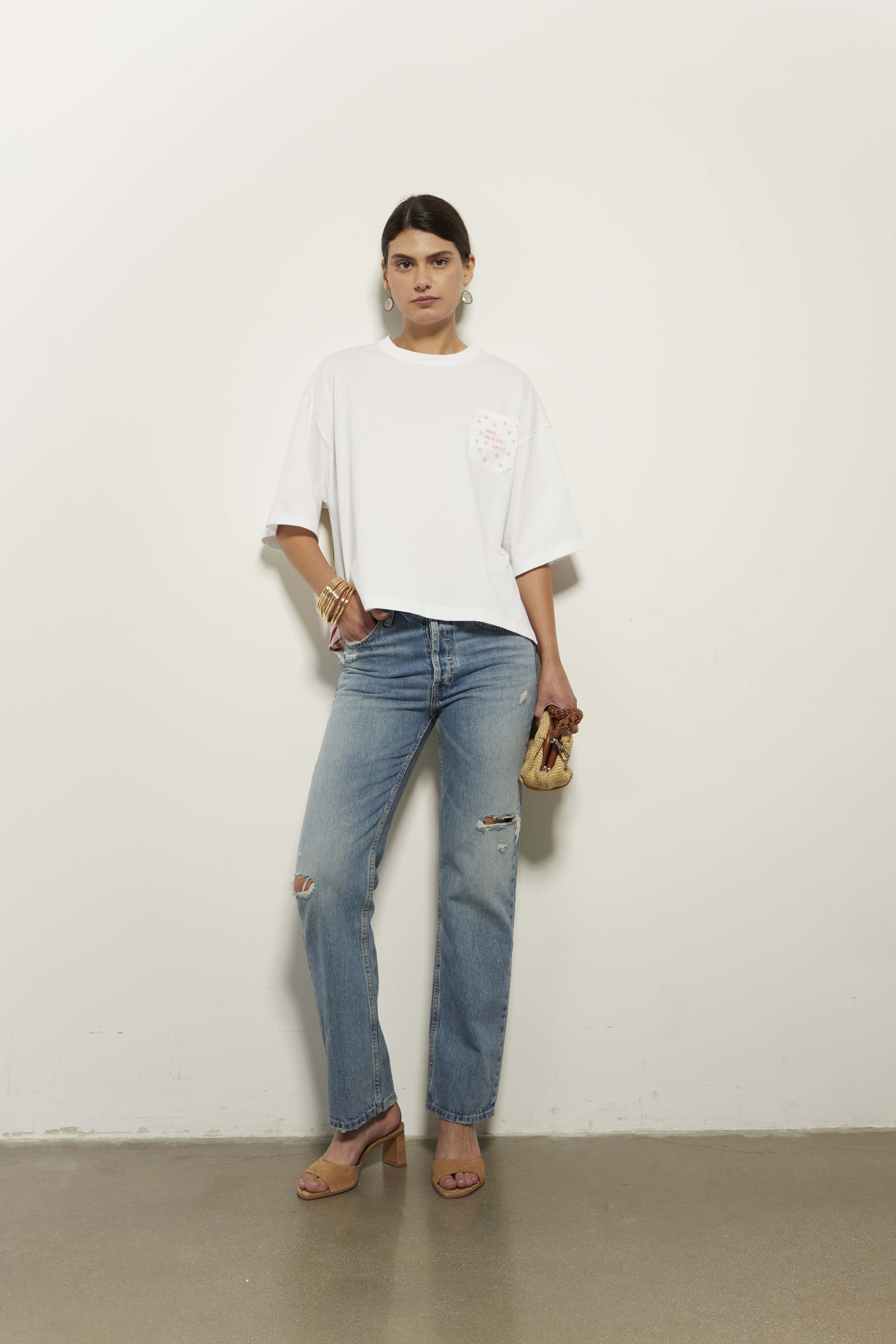 White T-shirt with floral texture and graphic details