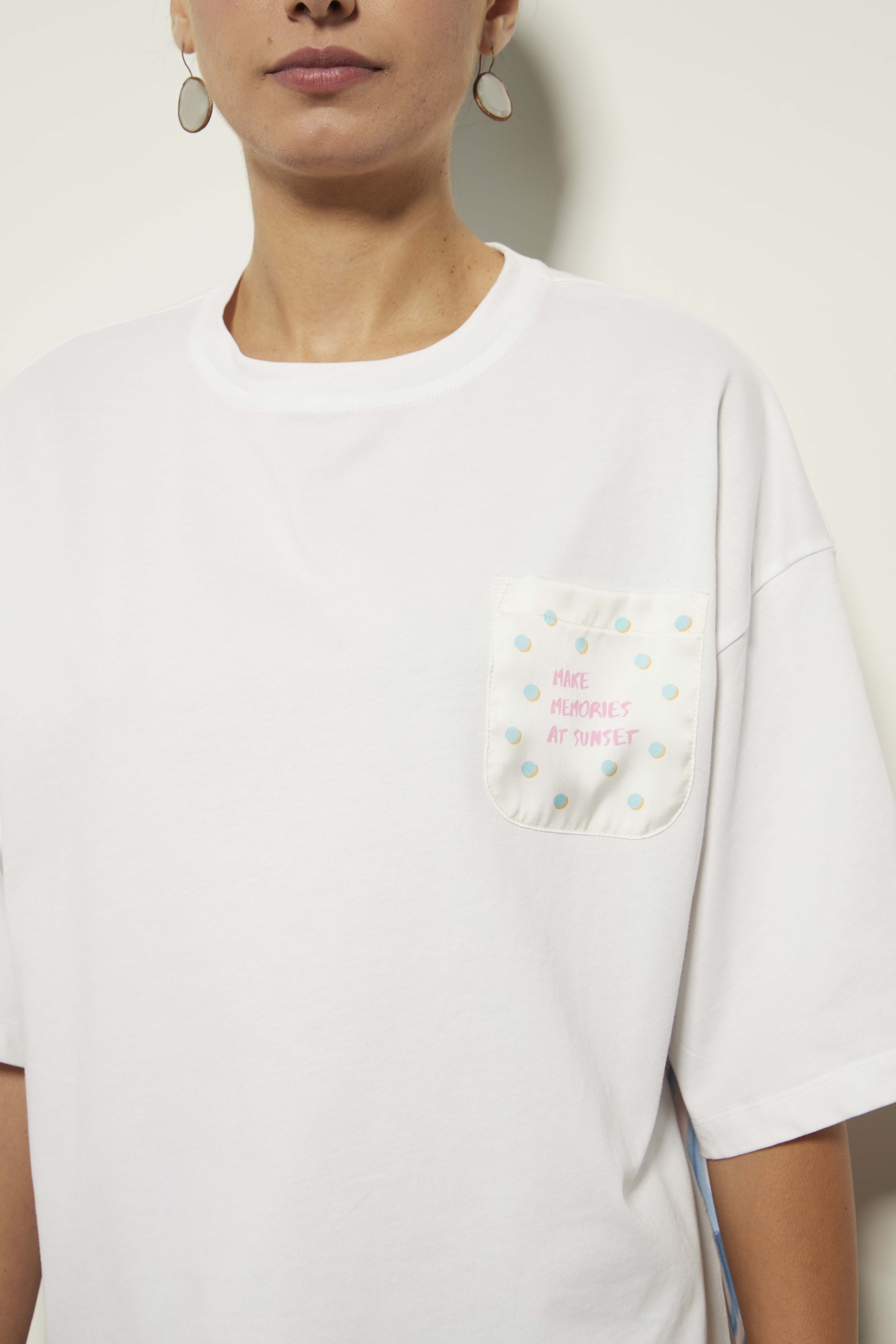 White T-shirt with floral texture and graphic details