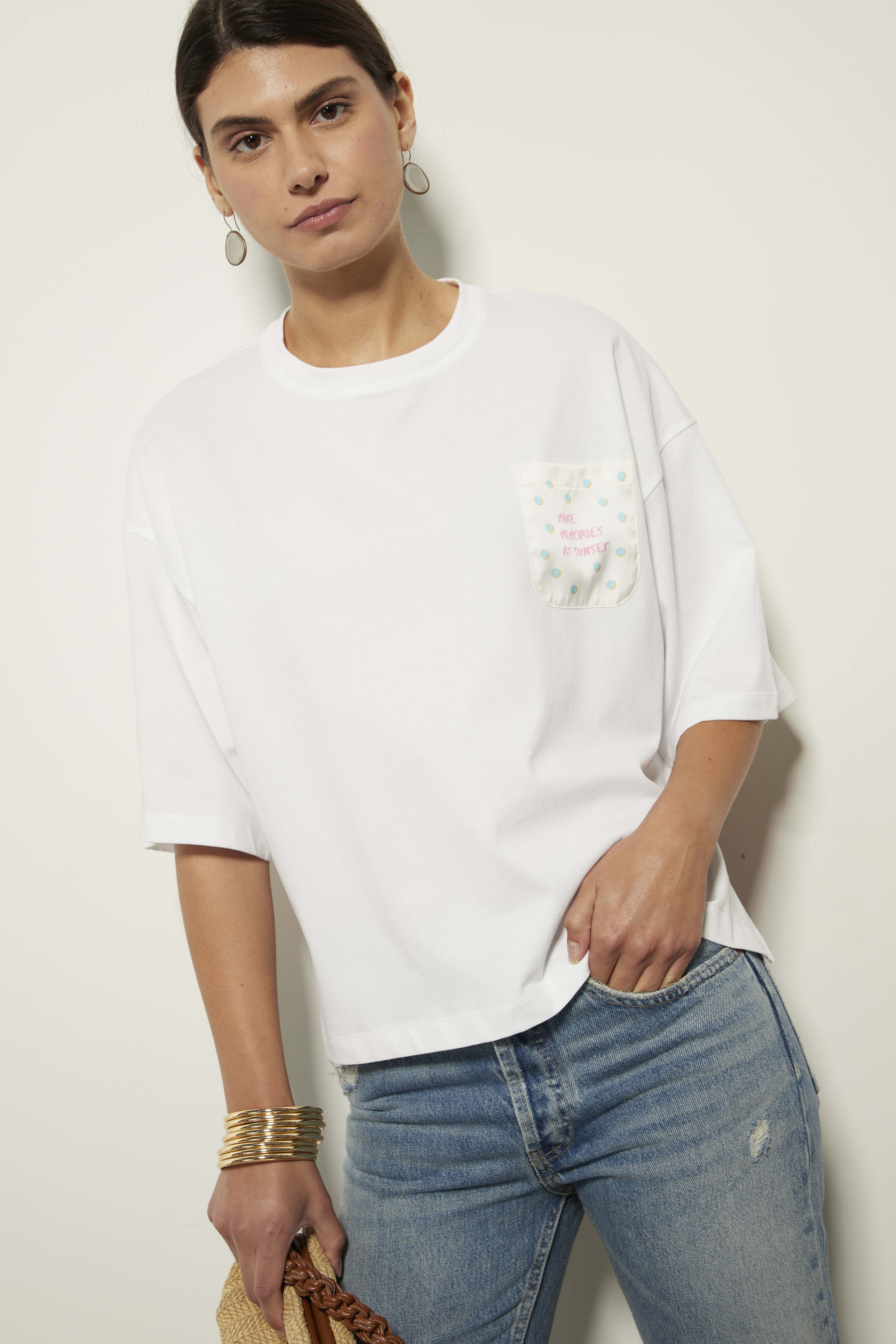 White T-shirt with floral texture and graphic details