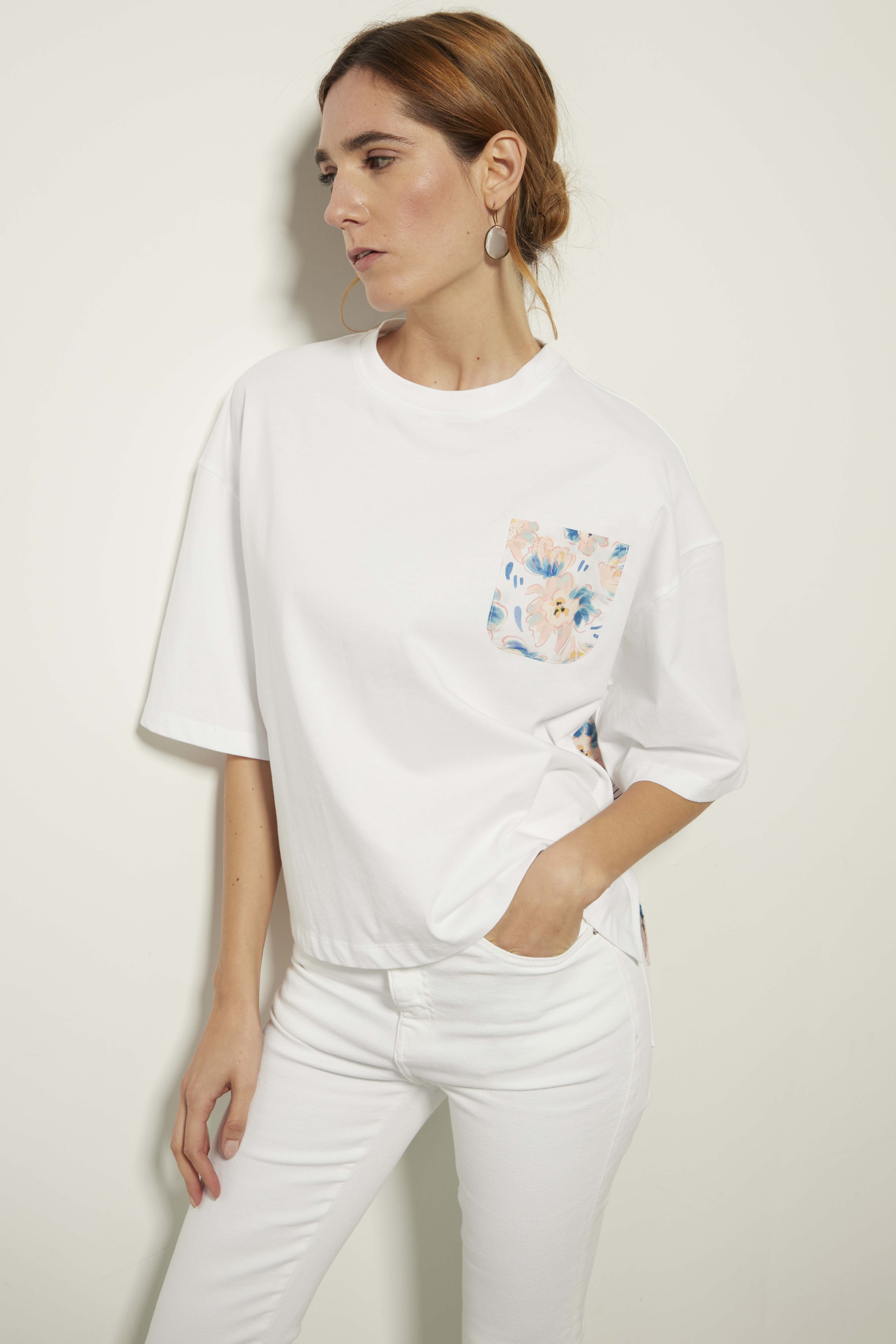 White T-shirt with floral texture and graphic details